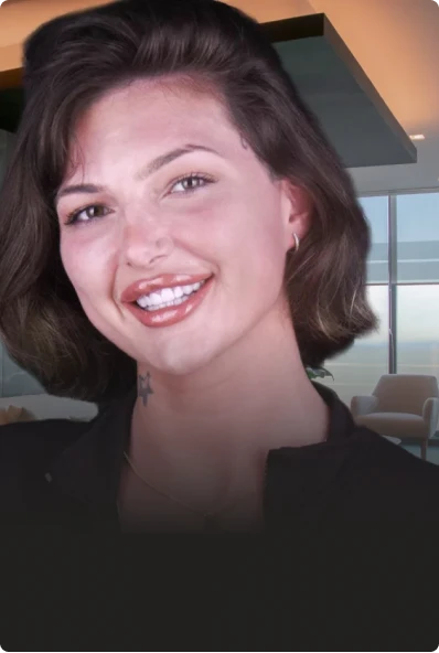 woman in her prime showcasing the results of herfull-mouth composite veneers