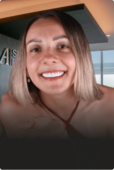 cheerful young woman showing-off her perfect smile made of lumineers