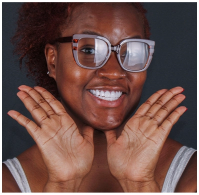 happy patient posing for an after photo with a perfect and bright smile