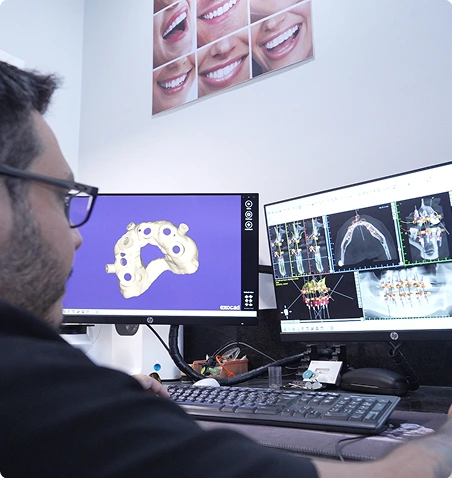 dental technician working on smile design software