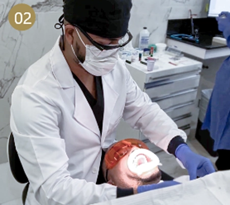 dentist performing dental treatment