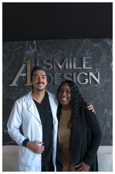 Dr. Genaro and patient in the clinic lobby