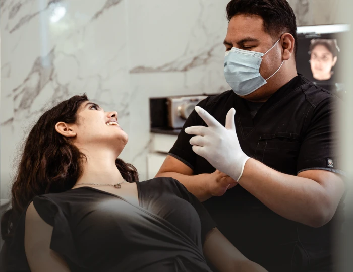 patient speaking with dental specialist during consultation